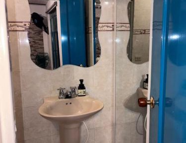Quadruple Room with Private Bathroom