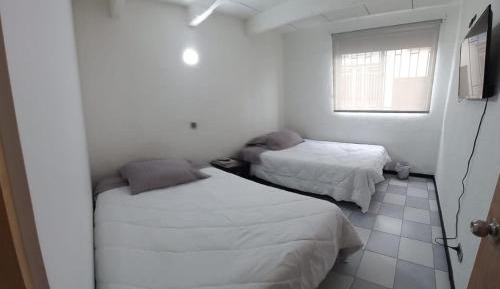 Quadruple Room with Shared Bathroom