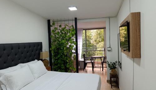 One-Bedroom Apartment with Balcony and City View