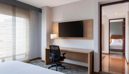 Two-Bedroom Suite with One King Bed and Two Queen Beds