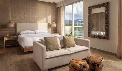 Junior Suite, 1 King, Sofa bed, Partial Ocean view, Balcony