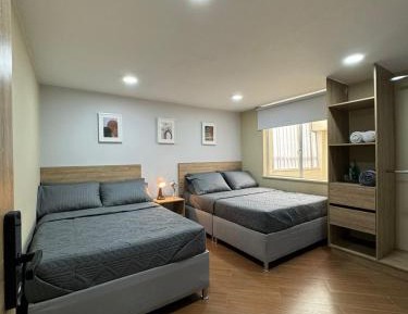 Quadruple Room with Private Bathroom