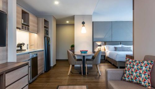 1 Bedroom Junior suite with 1 King, Sofa bed, City view