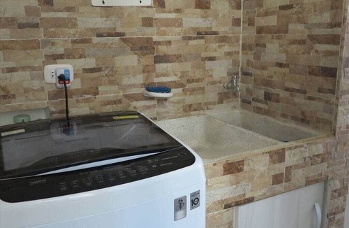Girardot Condo | Modern Elegance | Gem with Balcony and Four Pools