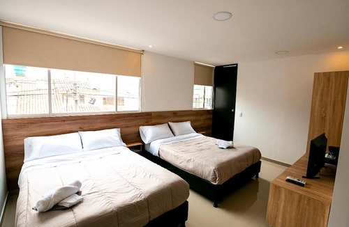 Modelia Hotel | Orange Wild