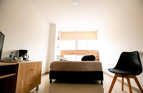 Modelia Hotel | Orange Wild