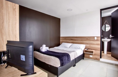 Modelia Hotel | Orange Wild