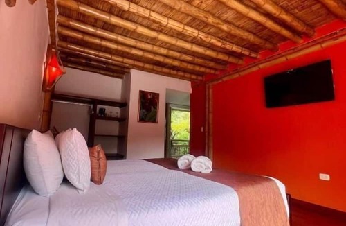 Zetaquira Hotel | Hotel y termales Las Heliconias