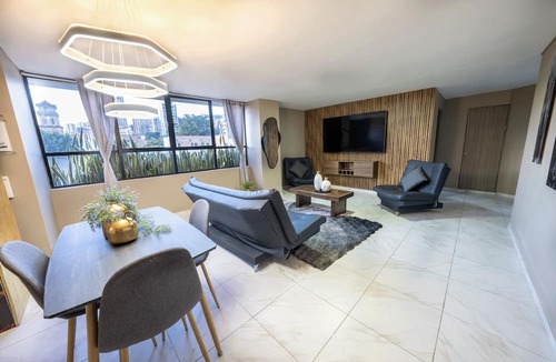 Zona Rosa Apartment | 3BR w Arcade 1 Block from Lleras Park