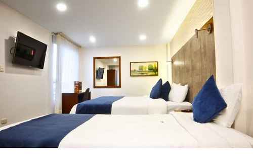 Modelia Hotel | Hotel CGH Travel INN Aeropuerto
