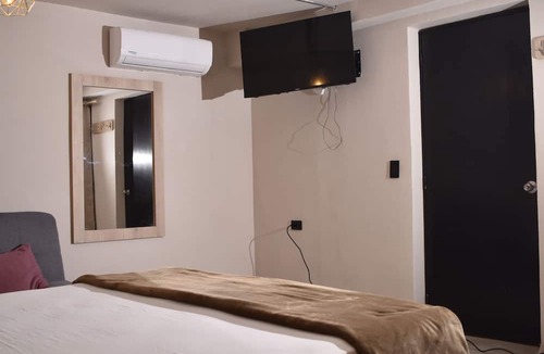Villa Nueva Hotel | History Center Hotel