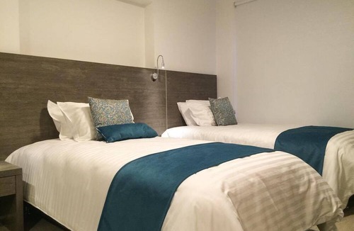 Barrios Unidos Hotel | Agora Suites Self-Service Boutique Hotel