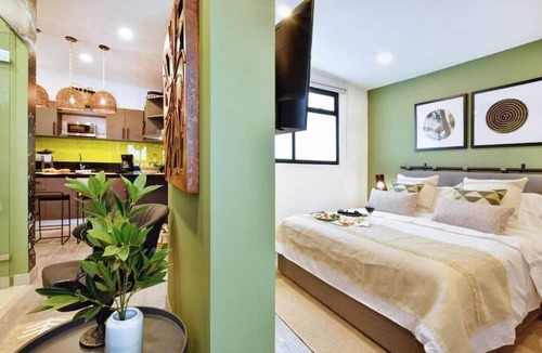 Laureles - Estadio Apartment | Evergreen 203 tropical jungle studio.