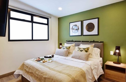 Laureles - Estadio Apartment | Evergreen 203 tropical jungle studio.