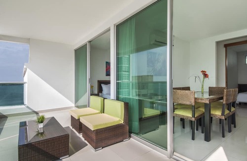 Castillogrande Apartment | Travelers Suites Orange Cartagena