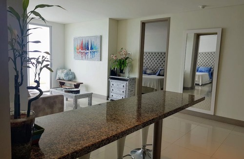 El Laguito Apartment | Spectacular beachfront apartment with pool!