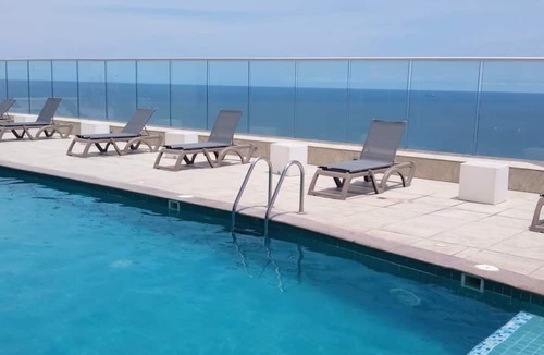 El Laguito Apartment | Spectacular beachfront apartment with pool!