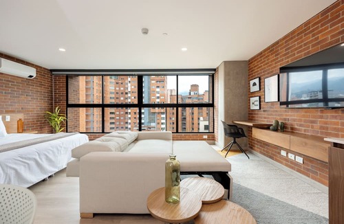 Laureles Apartment | Unique loft with 1BR & sofa bed, A/C, Terrace & Rooftop Gym