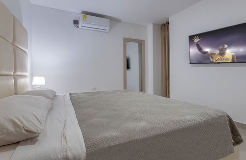 Urbanizacion Eliana Condo | Luxury Airport Penthouse - 3 BD 2 BA Suite + Rooftop Pool