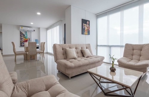 Urbanizacion Eliana Condo | Luxury Airport Penthouse - 3 BD 2 BA Suite + Rooftop Pool