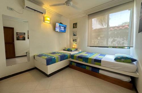 Tolu House | Lujosa cabana con piscina playa y servicio