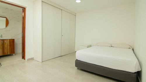 Castillogrande Apartment | Spacious 3BR Home In Castillo Grande By Huespedia