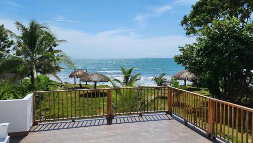 Monitos House | Casa Suite Palmar del viento FRENTE, FRENTE AL MAR by Amauna