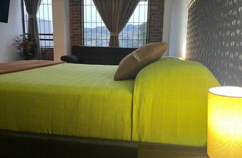 Tibasosa Apartment | Monoambiente con Vista - La Violeta