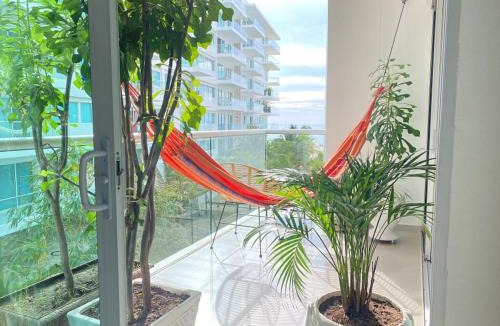 La Boquilla Apartment | Apartment in Beachfront Building with Resort Pools near Historic Center Cartagena