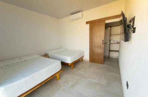 Tolu Apartment | Mykonos Beach House Apartamentos By Jerusalema