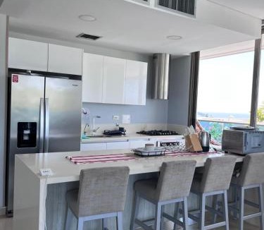 Pozos Colorados Apartment | Lujo Frente al Mar con Desayuno y Almuerzo Preparado para Tu Familia - Beachfront Luxury with Breakfast and Lunch Prepared for Your Family