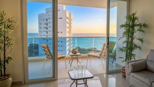 El Rodadero Apartment | Apartamento con vista directa al mar en Reserva del Mar - Balcón, playa privada y piscinas tipo resort