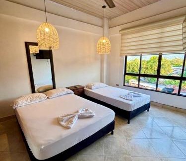 La Dorada Apartment | Casa Raíces "Aire acondicionado, habitaciones familiares y económicas en La Dorada"