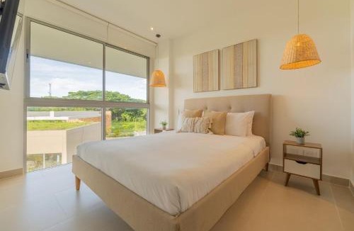 Zona Norte Apartment | Baia Kristal: playa privada, laguna y balcón