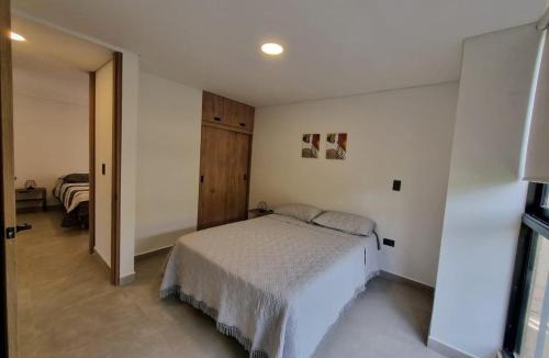 Guatape Apartment | Apartment with a hot tub and a view of Guatapé lake