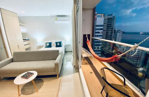 Historic Center Apartment | Blue Loft 14th floor with balcony overlooking the ocean and marina, Jacuzzi, Sauna, Turkish bath, swimming pool, gym, spa y bar