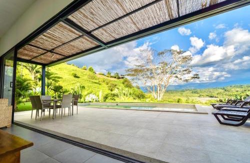 La Tebaida Villa | Modern Villa Surrounded by Nature and Gardens with Pool and Stunning Mountain and River Views