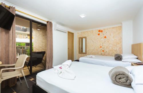 Laureles - Estadio Hotel | Hotel Colores Boutique