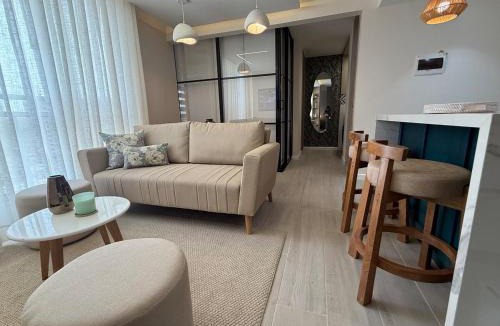 Riomar Apartment | Open Floor Chic Interior Design Pool Full Kitchen