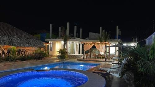 Juan de Acosta Apartment | Habitacion con piscina-jacuzzi-lavadora disponible