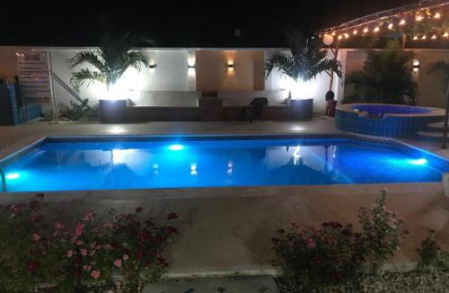 Juan de Acosta Apartment | Habitacion con piscina-jacuzzi-lavadora disponible