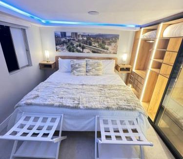 Medellin Apartment | Luxury Apartment Jacuzzi Air Conditioning Fireplace and King Bed