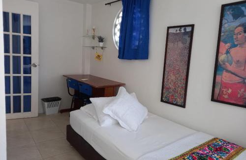 Cartagena Walled City Apartment | HPT-SC1 HABITACION DE HOTEL CUADRUPLE CON PISCINA AIRE ACONDICIONADO Y WIFi EN GETSEMANI