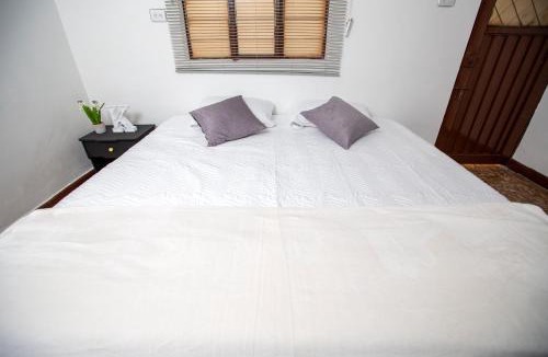 Popayan House | KOMODO Alojamiento - hostal autoservicio, cerca al centro - baño privado, wifi , cama 2x2, agua caliente, cocina comunitaria y las mascotas son bienvenidas