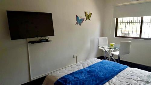 Cali Apartment | apartaestudio gran ubicacion y aire acondicionado