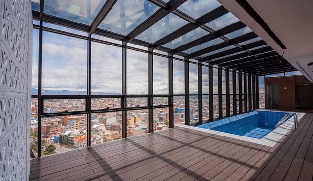 Elegant apartment with view of the city, mountains, 500 MB, swimming pool, gym and spa