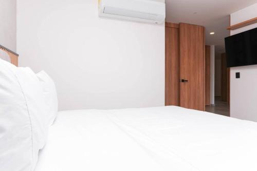 Metropolitan Living by HOUSY in Medellín