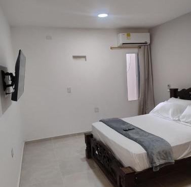 Suite moderna con parqueadero y cocina equipada