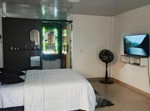 Suite campestre a 5 minutos del parque con aire acondicionado