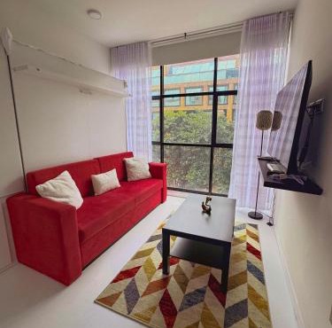 Apartamento de Lujo Parque 93 Cowork - gimnasio
